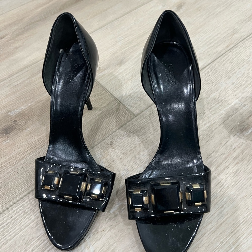 Gucci sandal with gold hardware and jewl